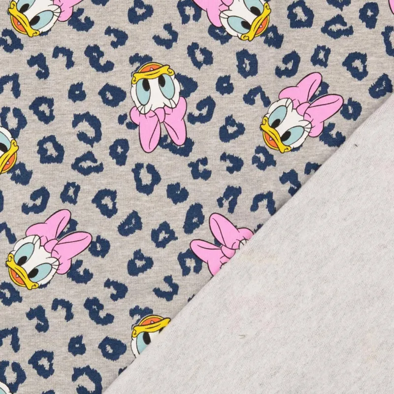 1 coupon de 111 cm  Tissu Disney jersey French terry motifs Daisy et léopard - oeko tex
